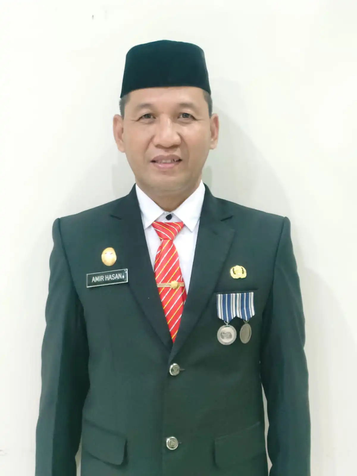 AMIR HASAN, STP, SH, M.Si